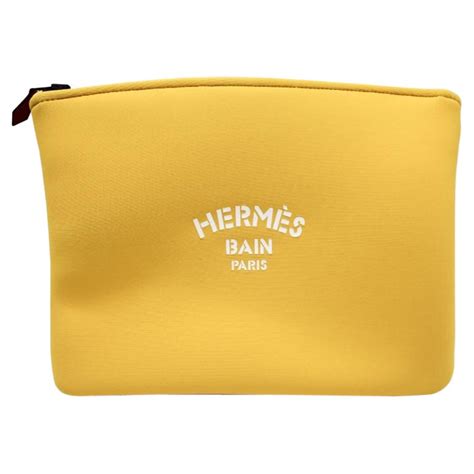 hermes neoprene pouch.